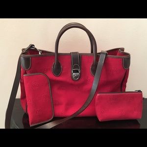 Dooney & Burke red satchel purse with eye glasses $ cosmetics case